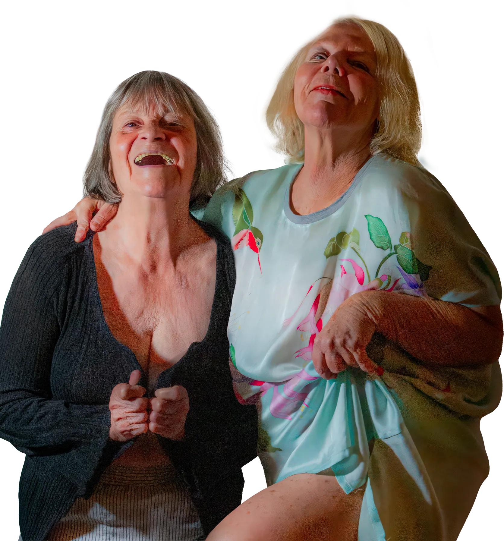 Kathy Tanner and Jenny Simanowitz laughing together on stage